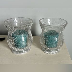 votive candle holders with votive candle in each. Comes from smoke free home